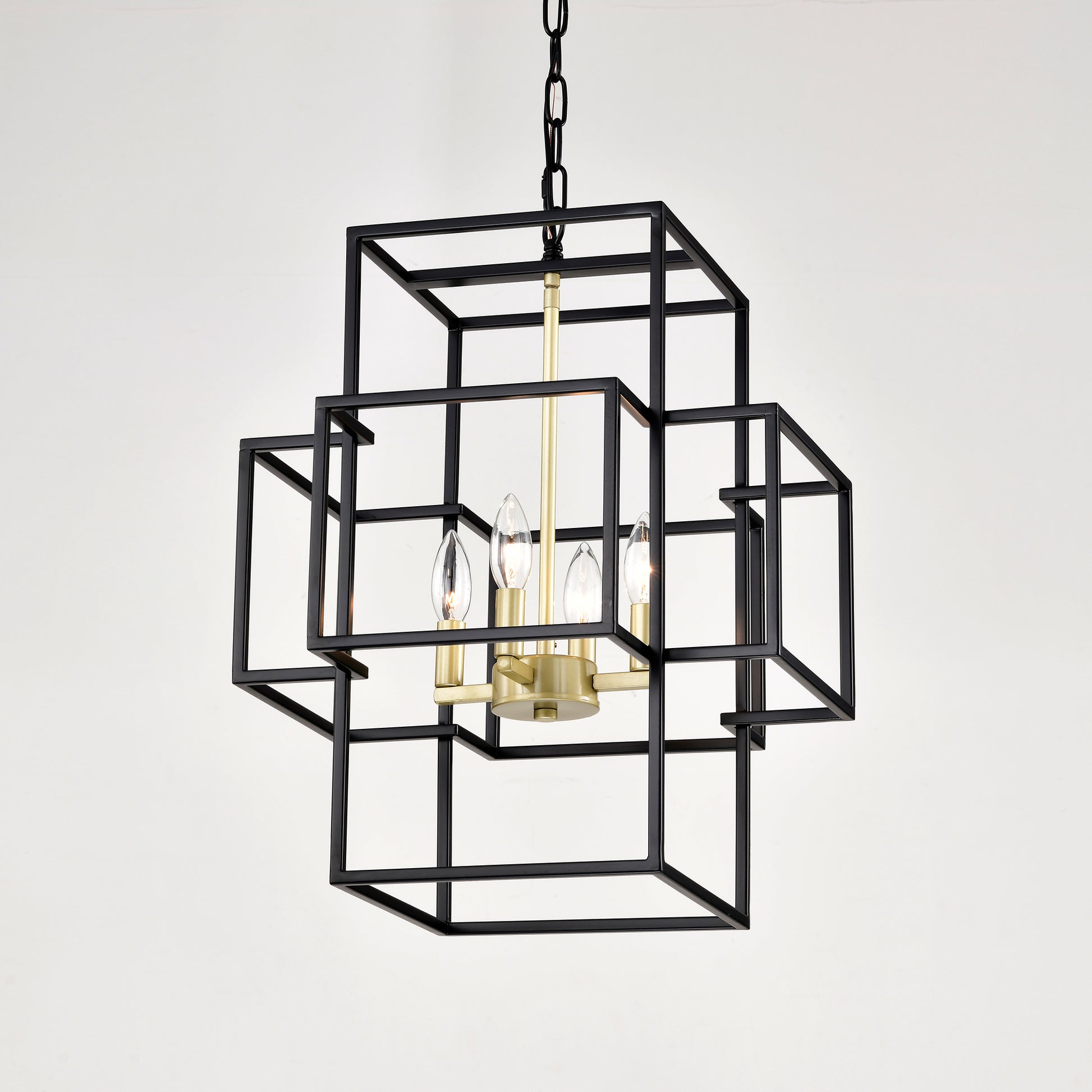 Black geometric cage chandelier with brass accents and clear candelabra bulbs