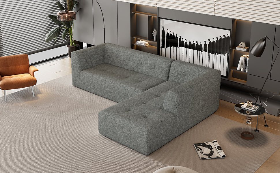 Plush grey fabric Lshaped sectional sofa with button tufting and square arms