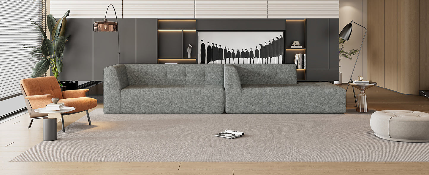 Modern grey fabric sectional sofa with clean lines for contemporary living spaces
