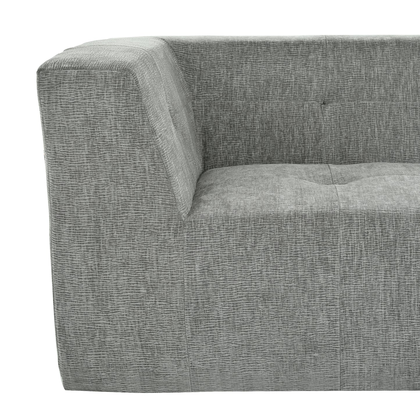 Close up of a textured grey fabric sofa showing detailed weave patterns and button tufting on the seat cushion