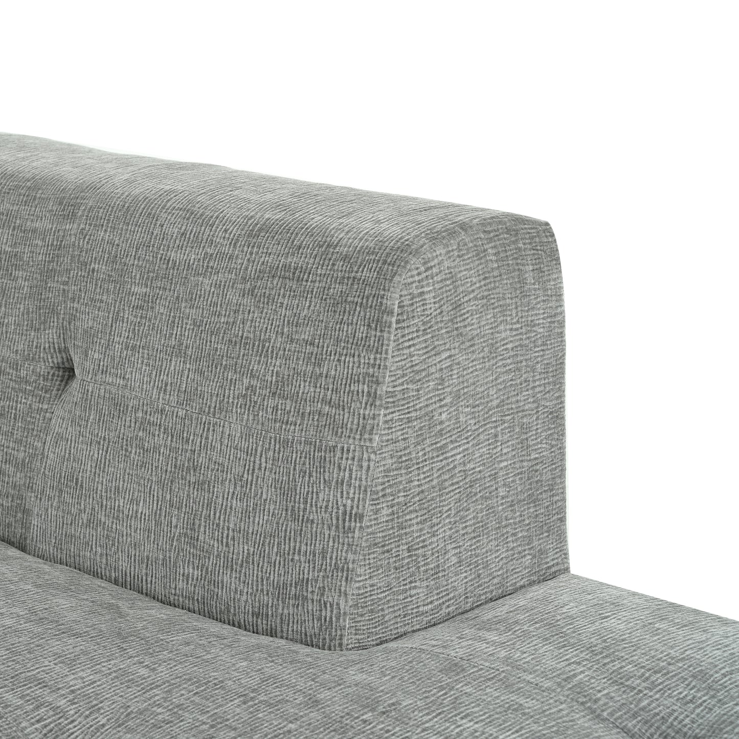 Textured grey fabric sofa armrest with subtle tufting detail modern living room furniture