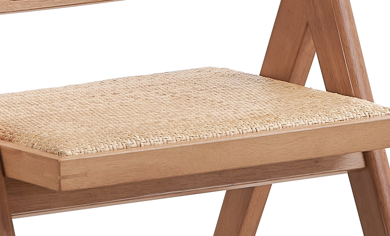 Closeup of a woven cane seat on a modern wooden chair