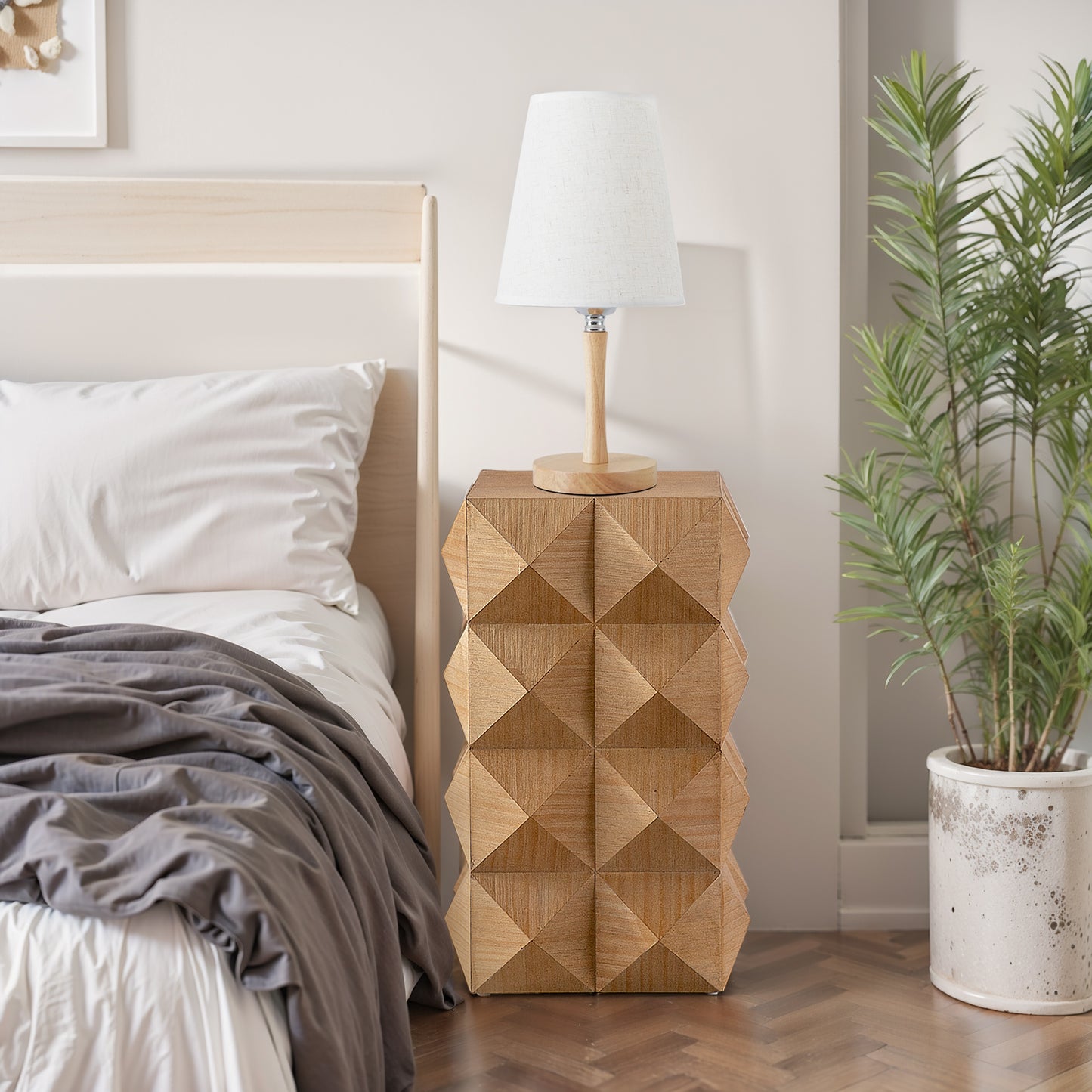 Geometric wood accent table with a faceted design perfect for modern bedroom decor