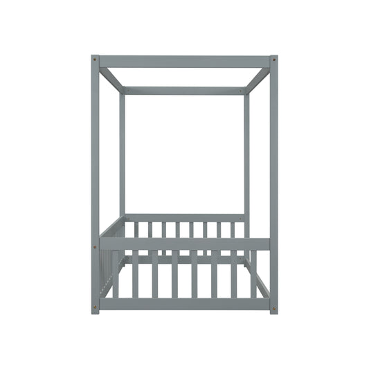 Gray wooden canopy bed frame with slatted sides and posts