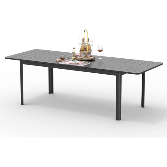 Dark gray modern rectangular outdoor dining table with slatted top ideal for patios