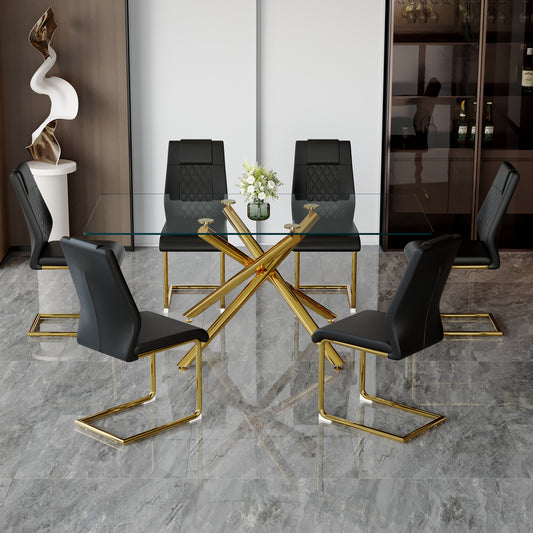 Modern glass dining table with striking gold geometric base featuring six black upholstered chairs