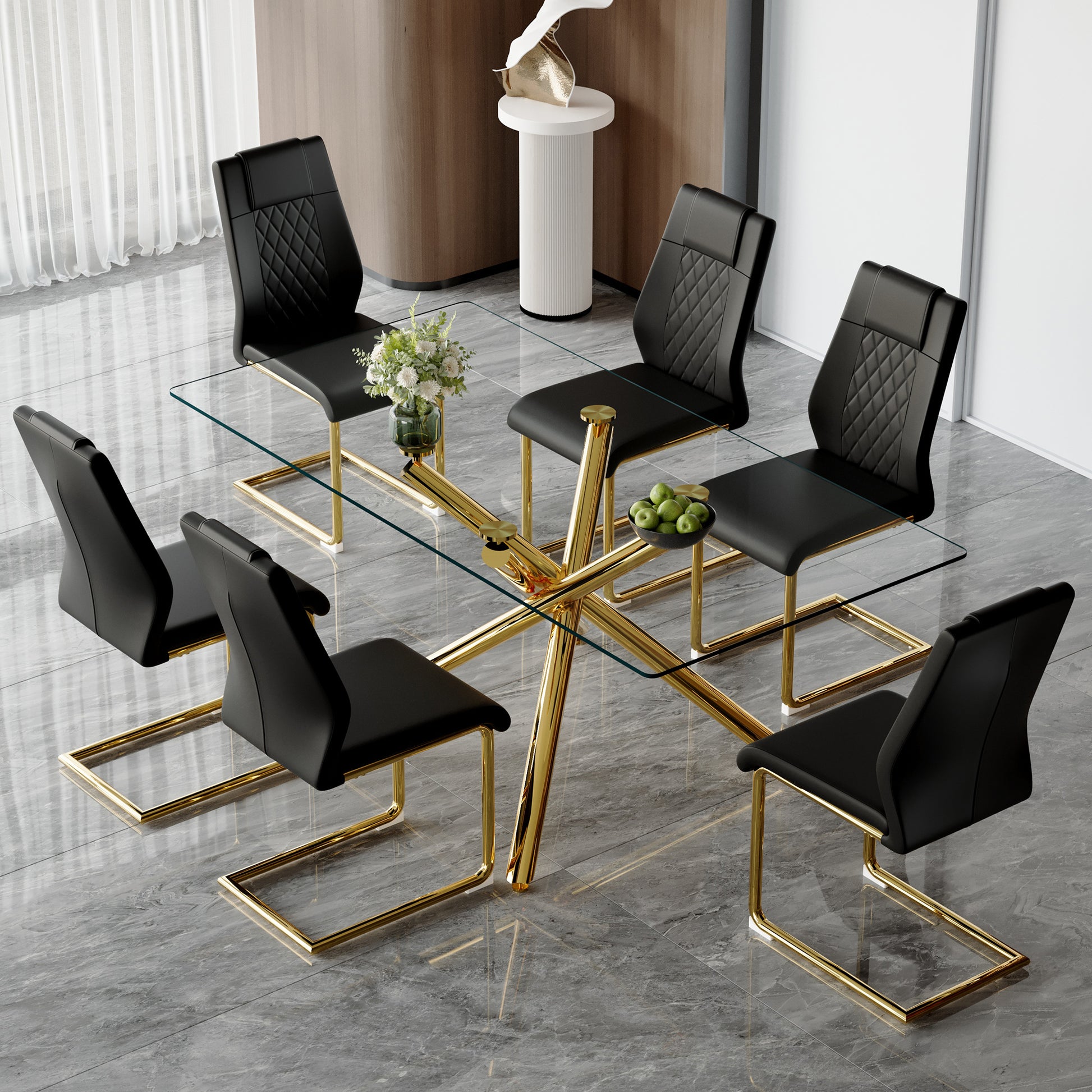 Modern black leather dining chairs with diamond tufting and gold legs