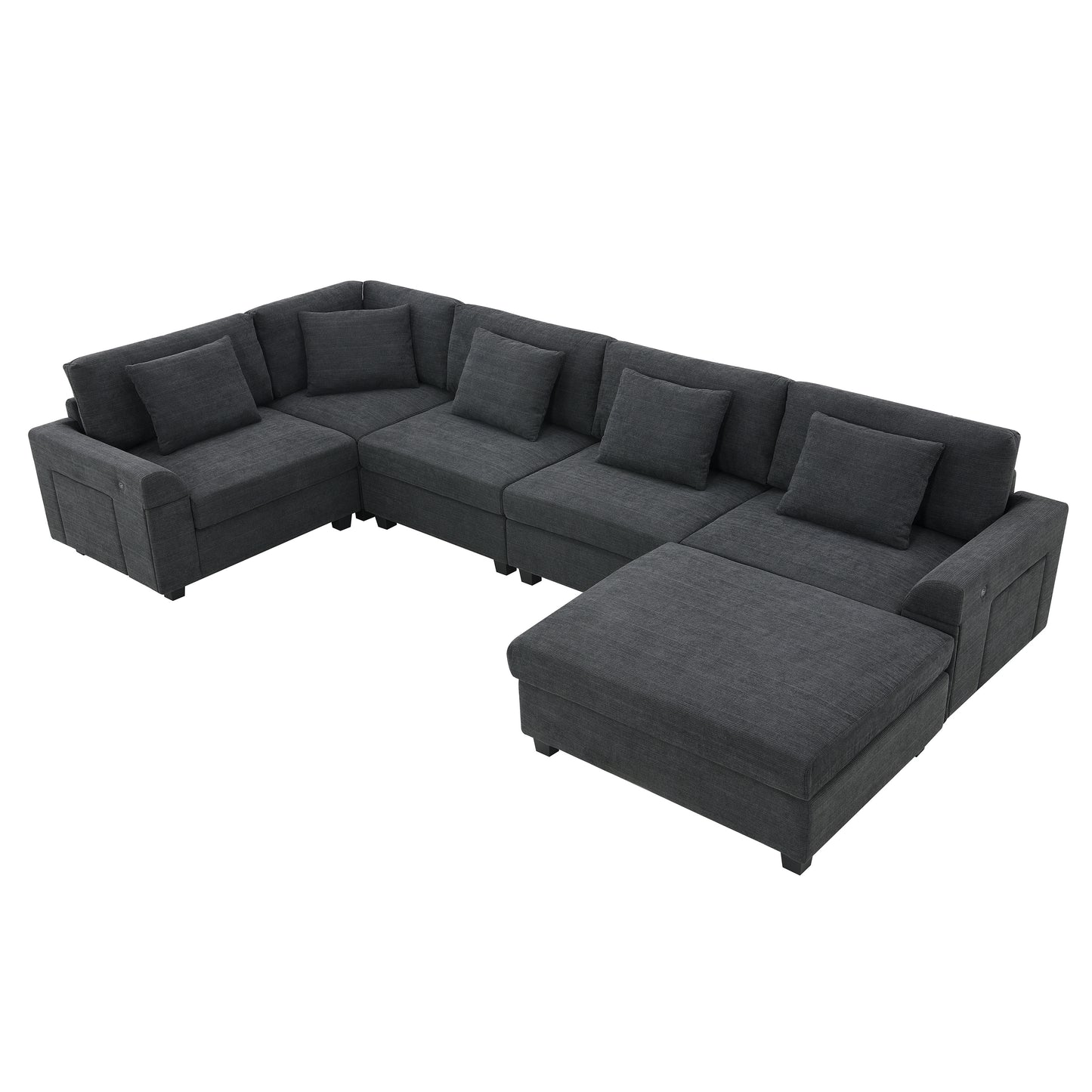 Dark gray fabric sectional sofa with plush cushions and a chaise lounge