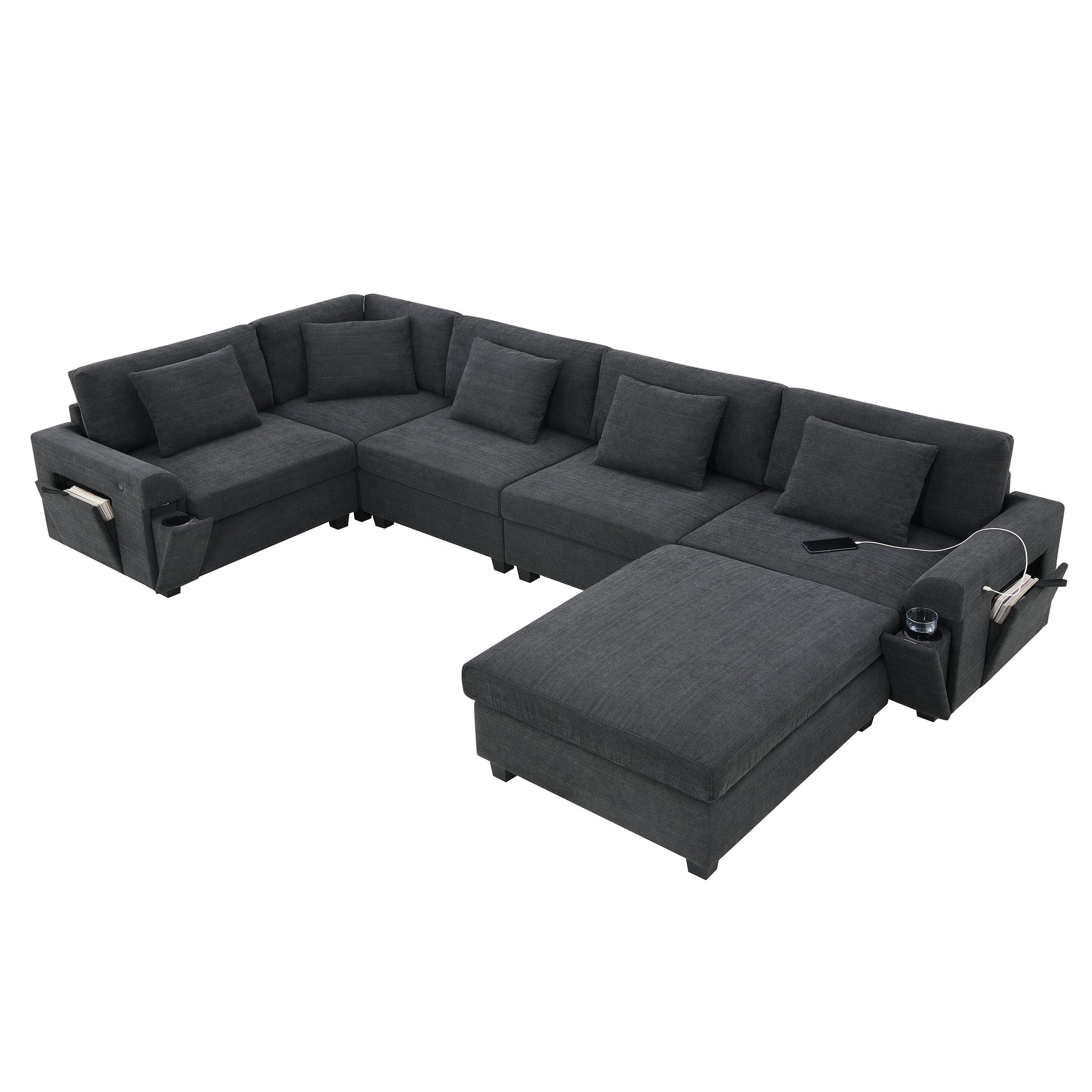 Dark gray sectional sofa with chaise featuring builtin cup holders and USB ports for modern living