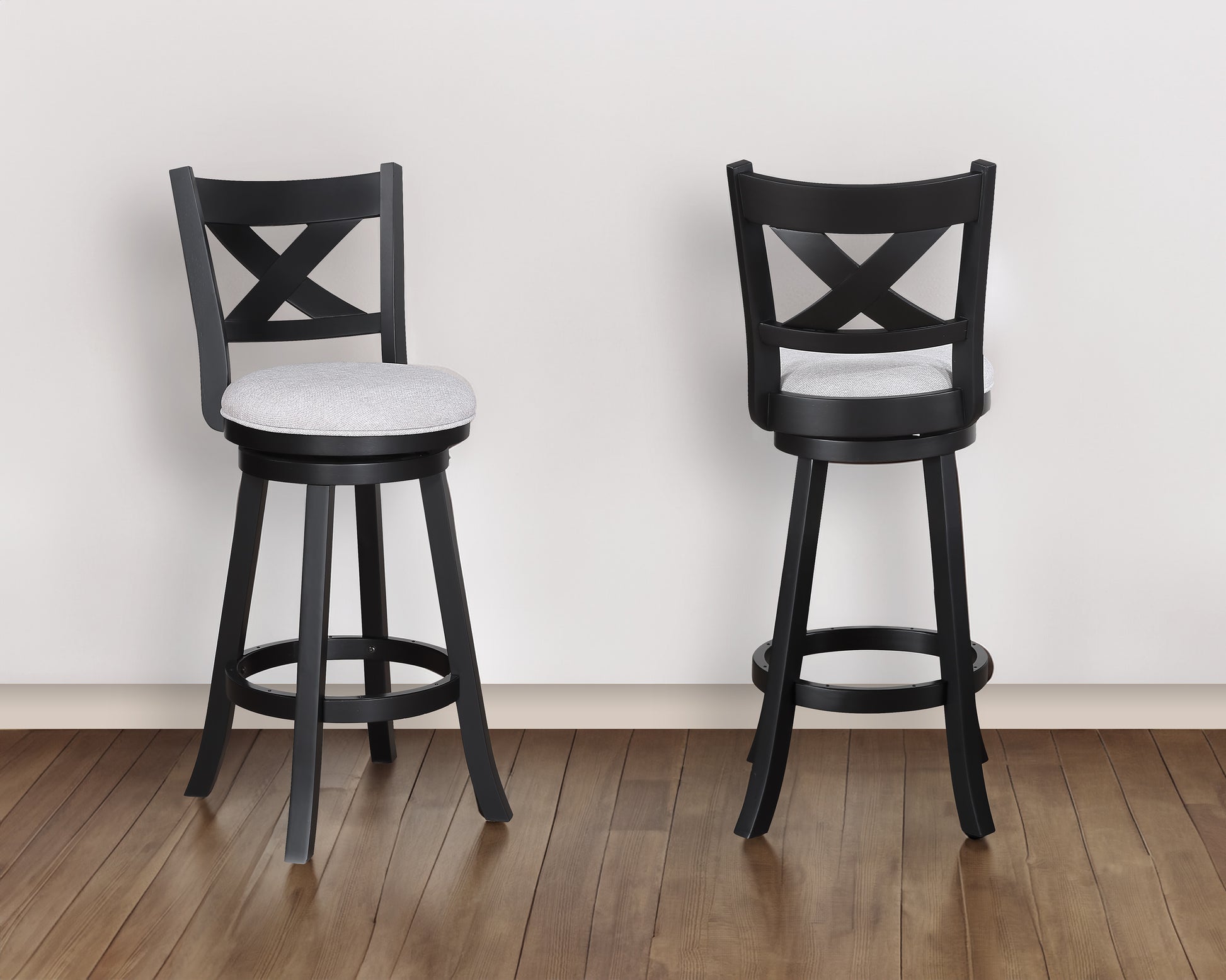 Black wooden swivel bar stool with grey upholstered seat and Xback detail