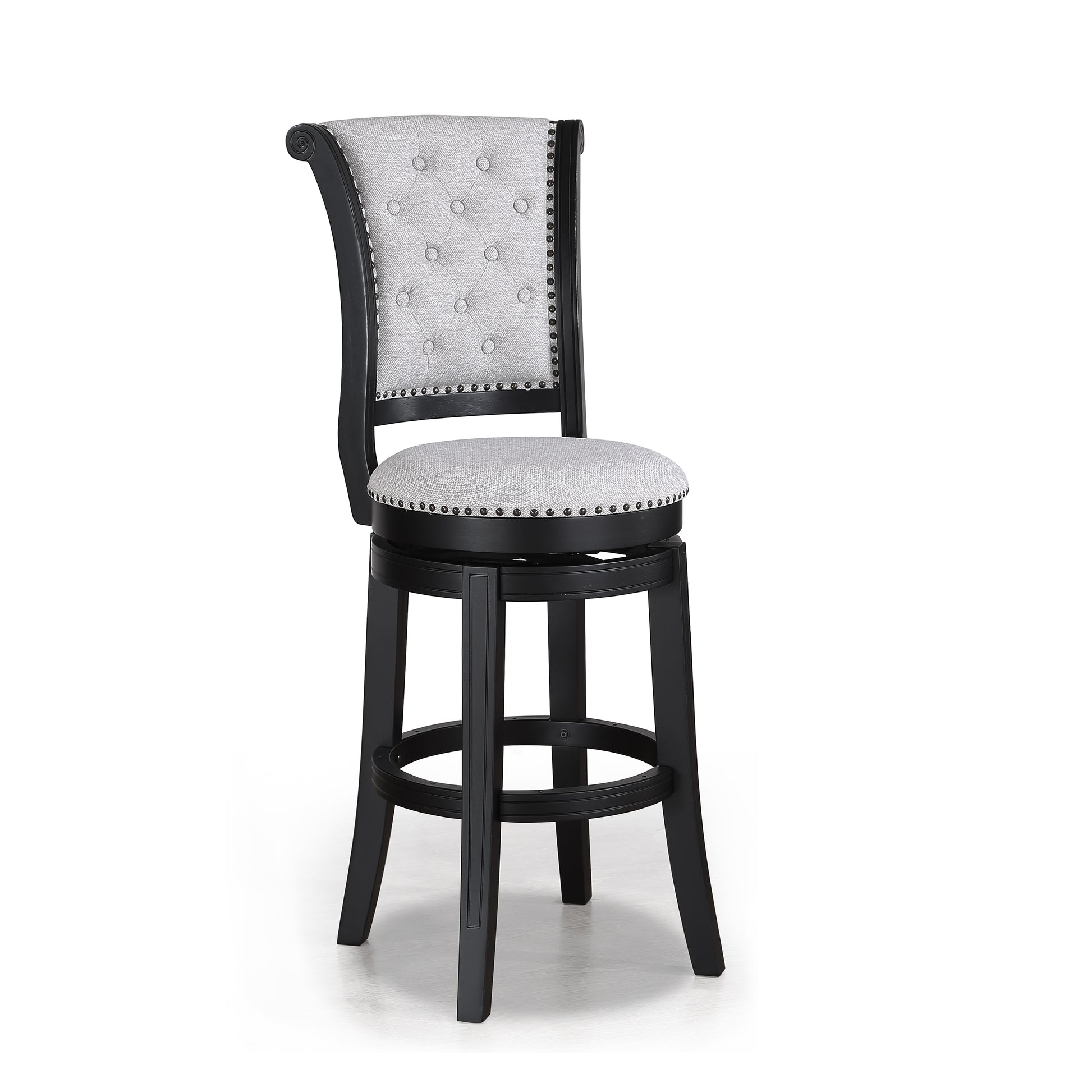 Tufted grey fabric bar stool with silver nailhead trim and black wooden legs perfect for kitchen island