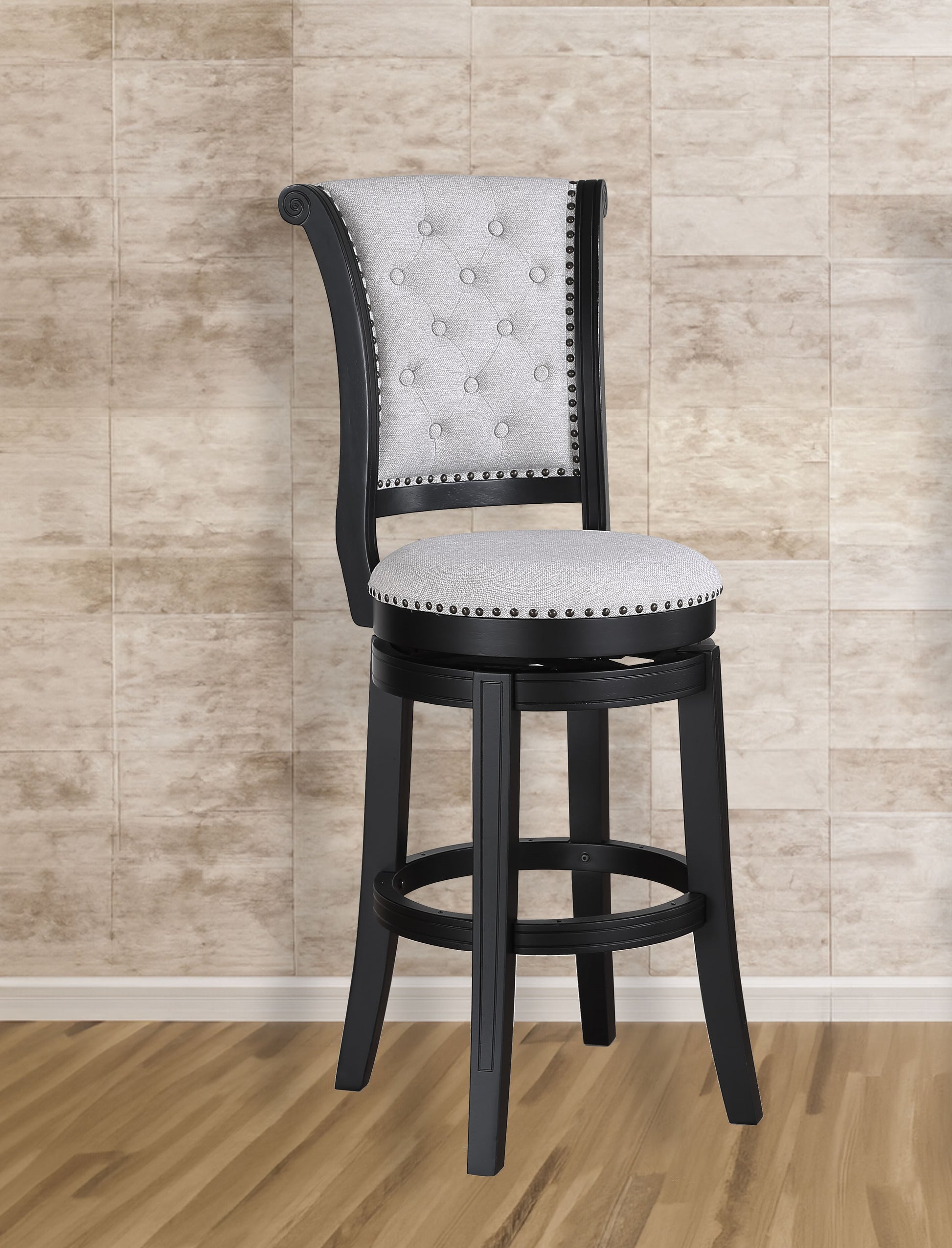 Black wooden swivel bar stool with tufted light grey fabric seat and backrest