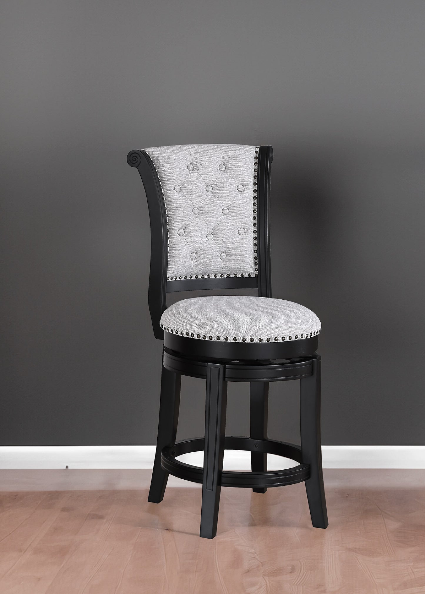 Black wooden swivel bar stool with light gray tufted fabric seat and back