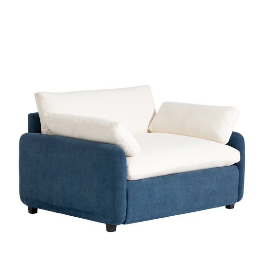 Modern navy blue armchair with plush cream cushions and a clean contemporary design