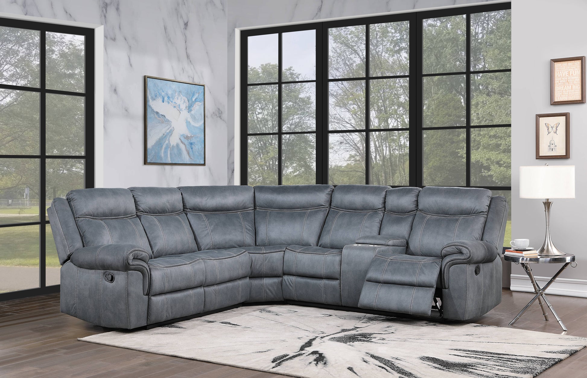 Gray reclining sectional sofa with white contrast stitching perfect for modern living rooms