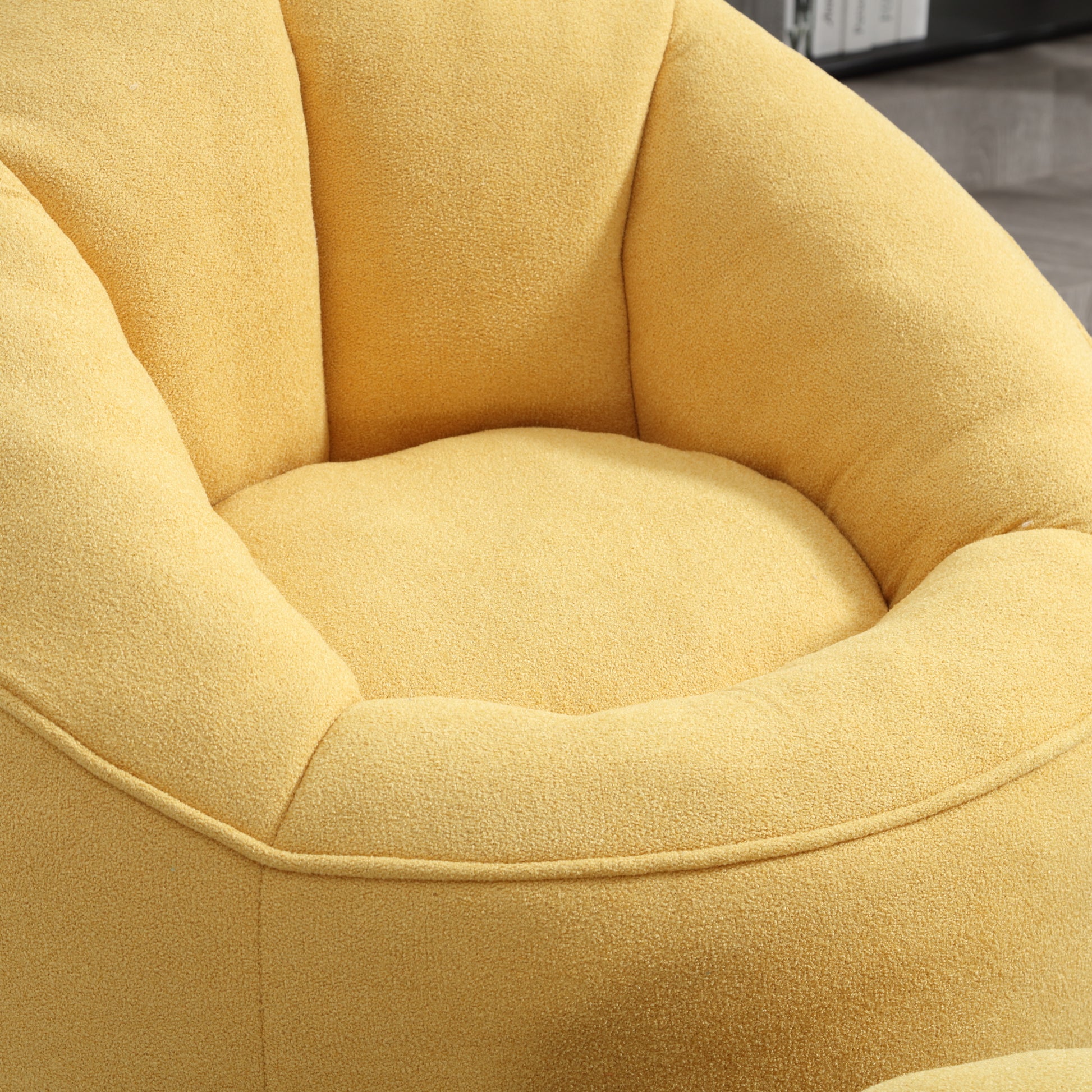 Plush yellow accent chair with soft boucle fabric and tufted details