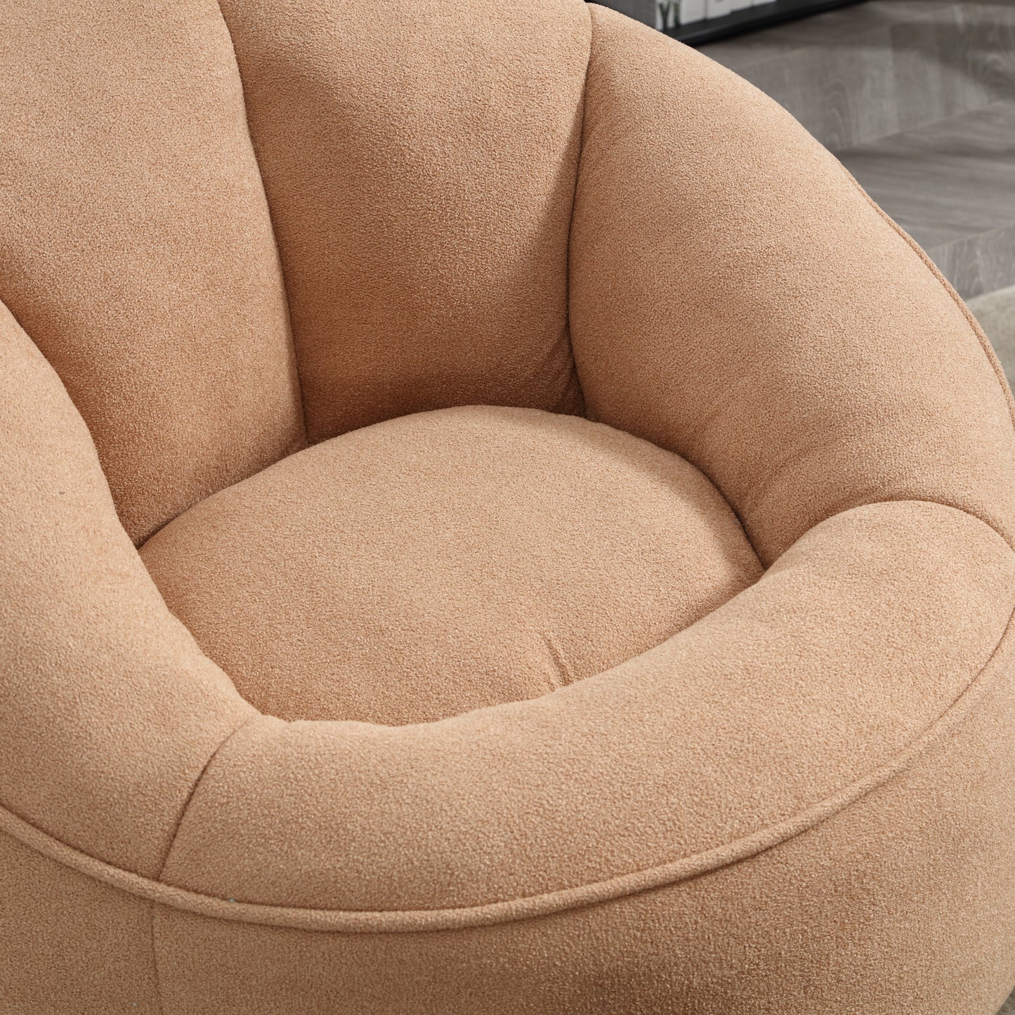 Plush beige accent chair with soft textured fabric perfect for cozy living rooms