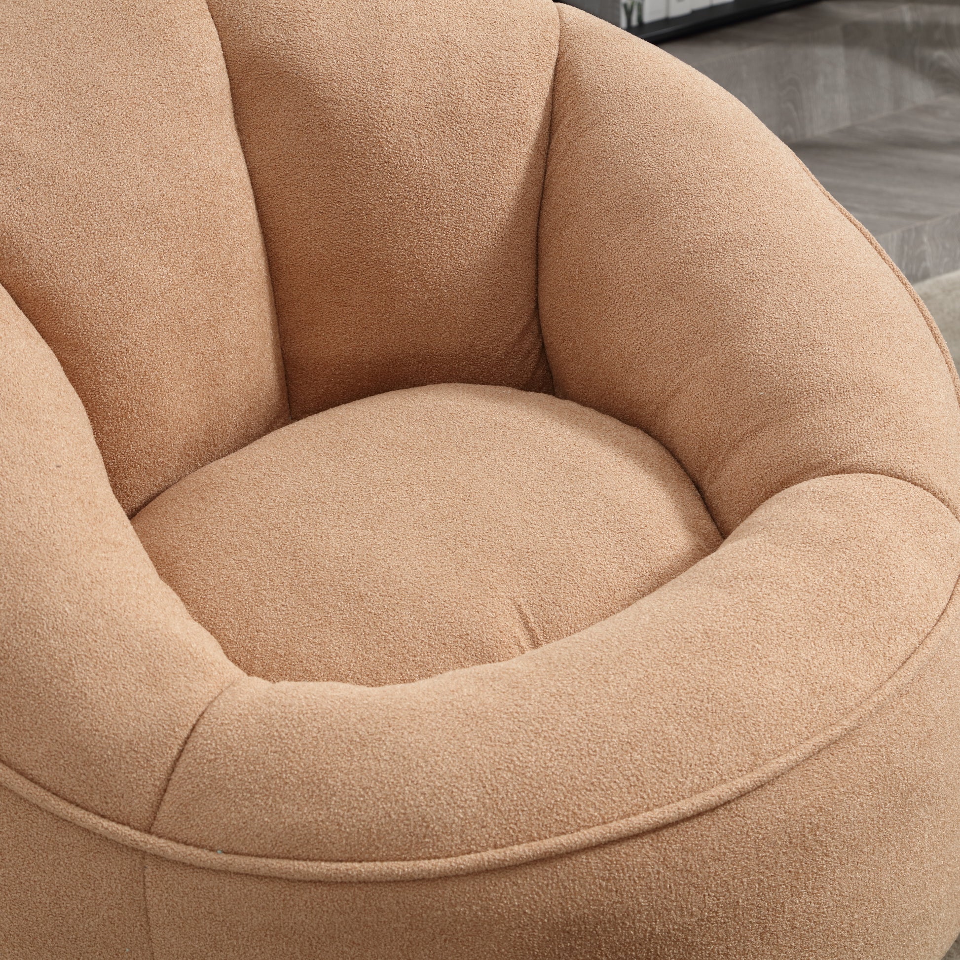 Plush beige accent chair with soft textured fabric perfect for cozy living rooms