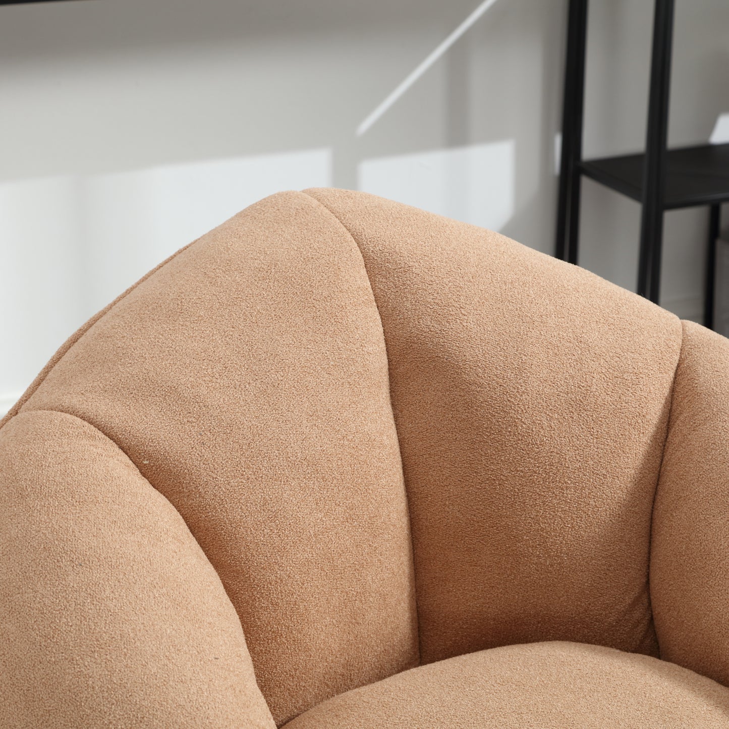 Soft teddy fabric accent chair in a warm beige perfect for cozy living spaces