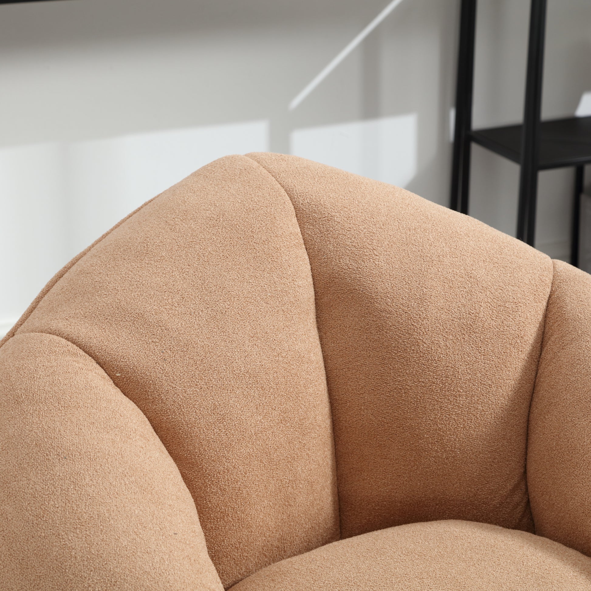 Soft teddy fabric accent chair in a warm beige perfect for cozy living spaces