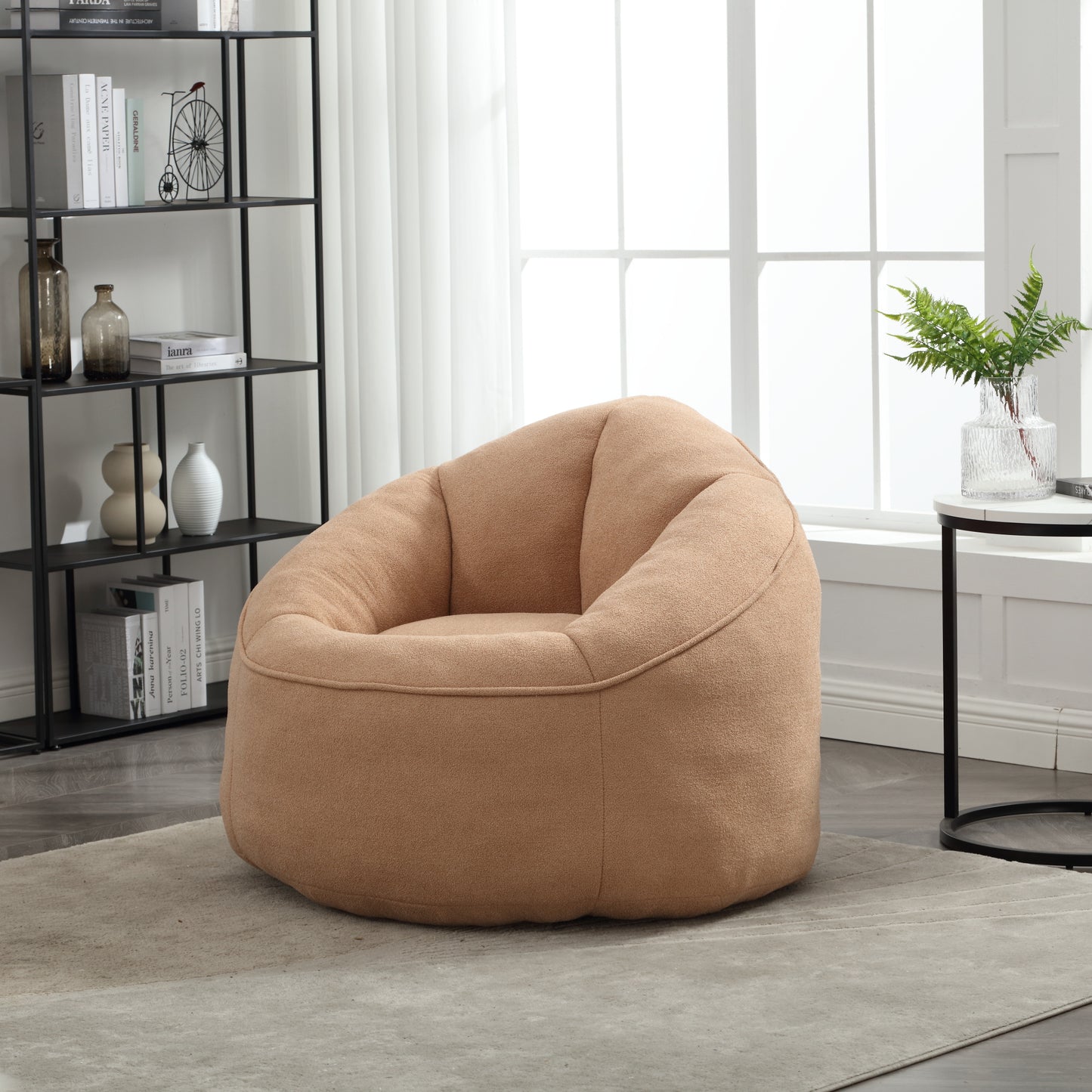 Comfortable tan boucle fabric bean bag chair for a relaxed living space