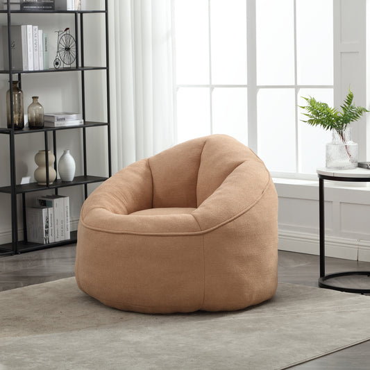 Comfortable tan boucle fabric bean bag chair for a relaxed living space