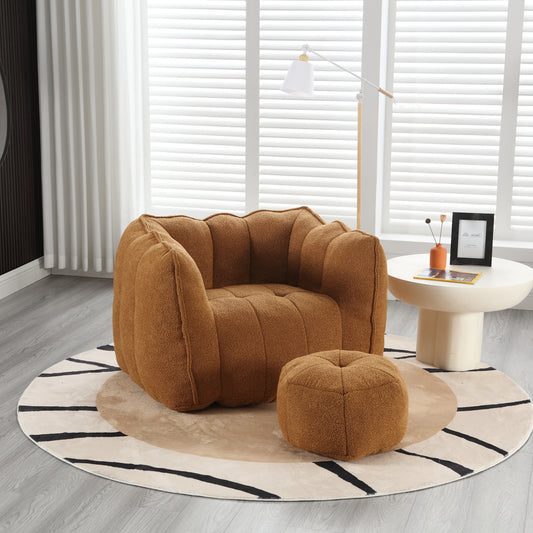 Brown boucle armchair with a matching ottoman featuring channel tufting and a plush texture