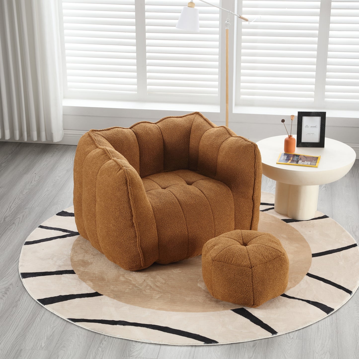 Cozy caramel teddy fabric armchair with a matching ottoman for ultimate comfort