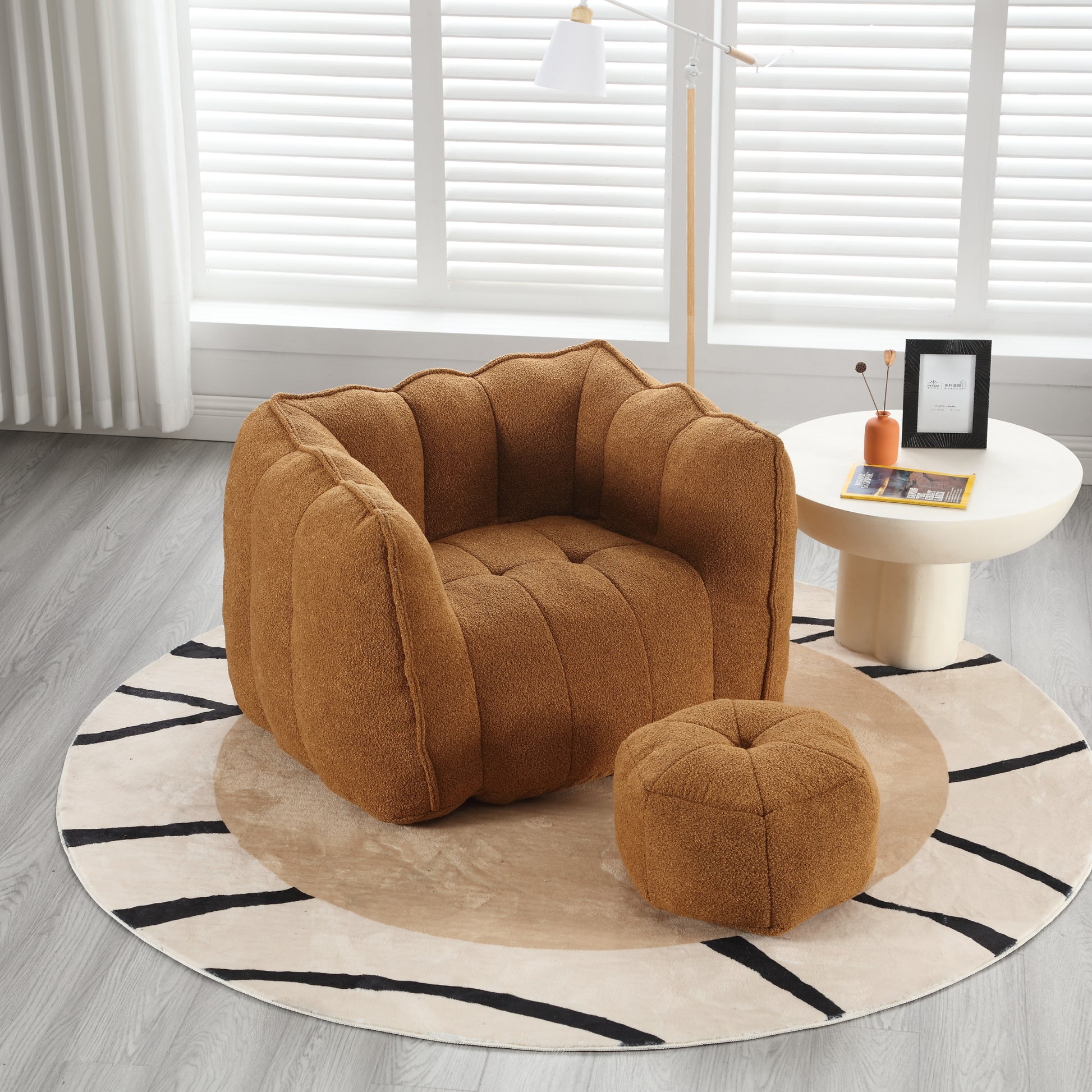Cozy caramel teddy fabric armchair with a matching ottoman for ultimate comfort