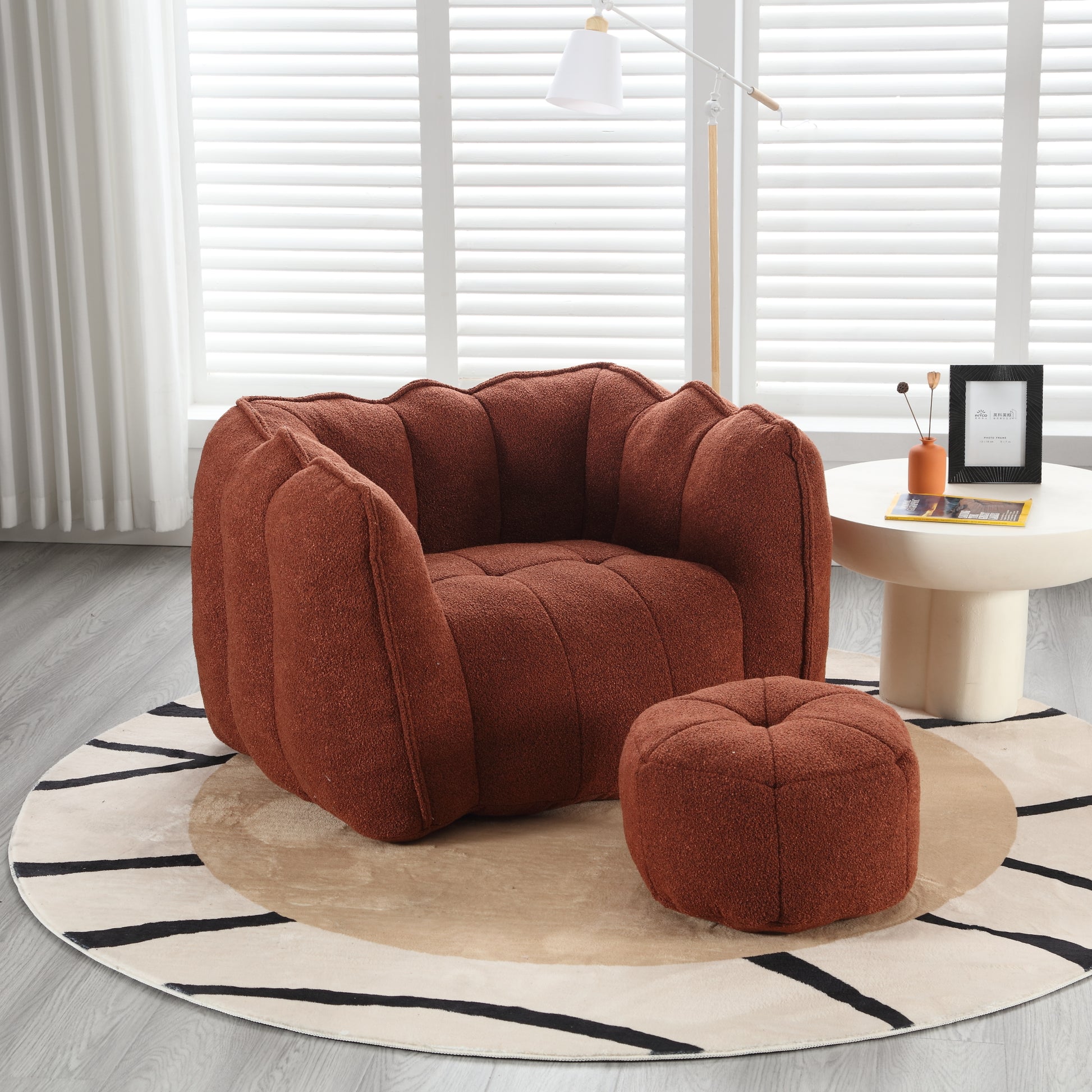 Rust boucle accent chair with matching ottoman ideal for modern living rooms