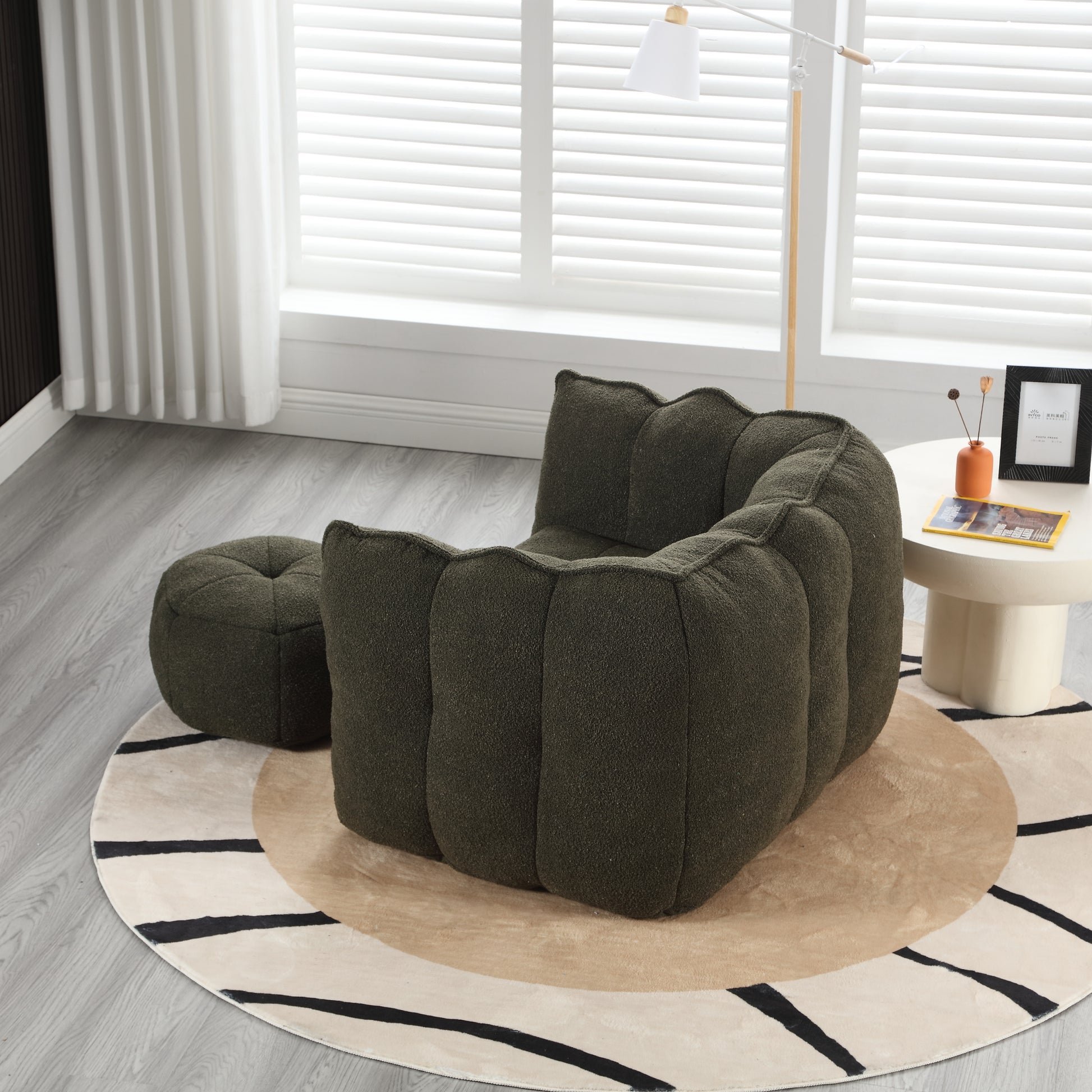 Dark green textured armchair and ottoman set with unique segmented design