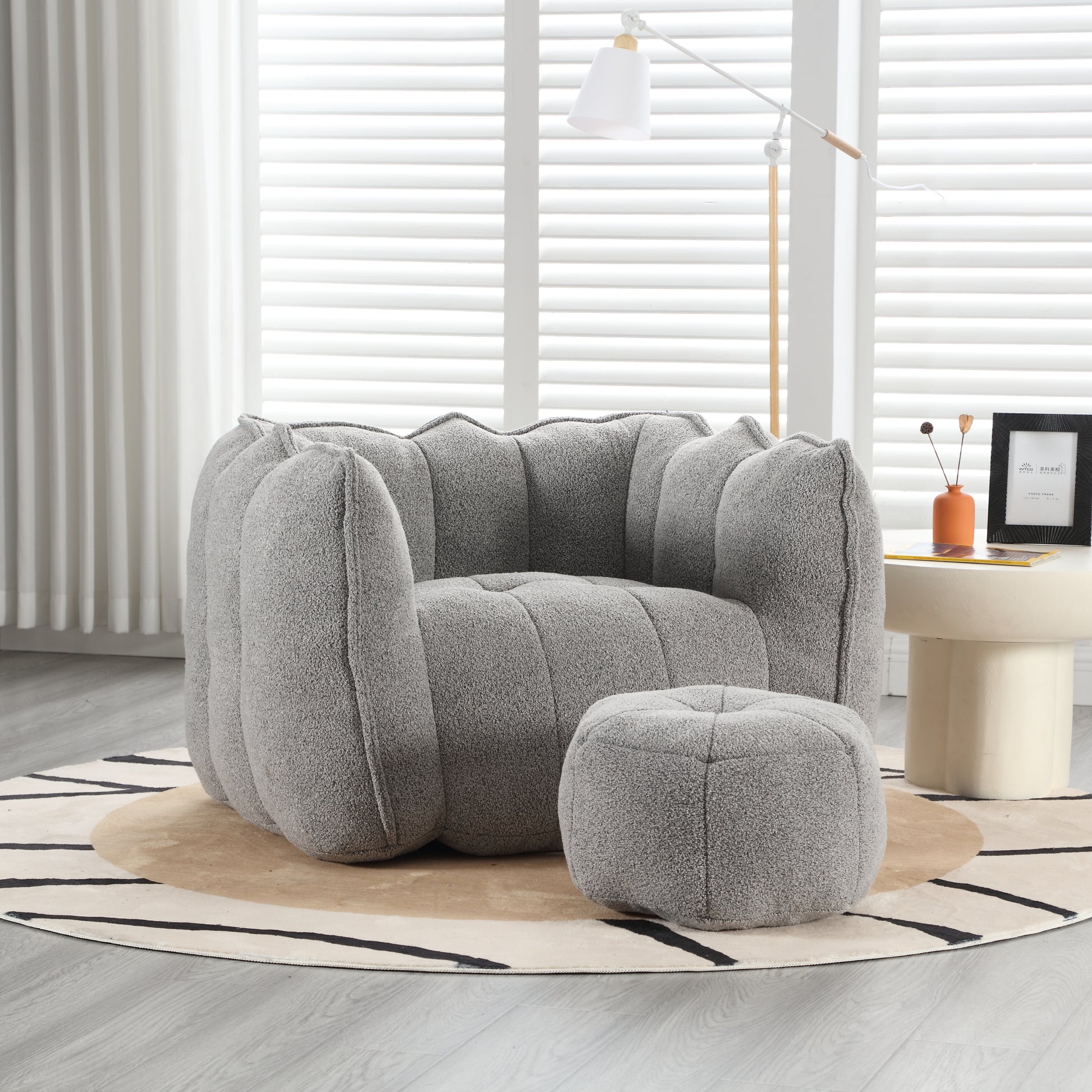Textured gray boucle armchair and ottoman set for living room