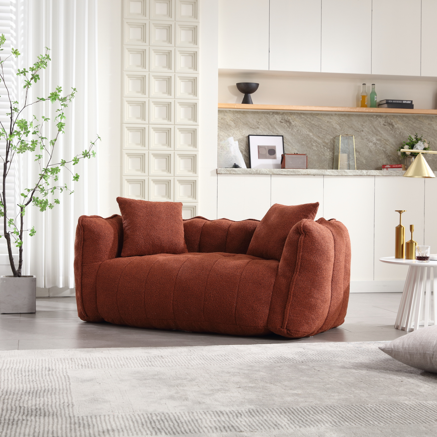 Plush rustcolored loveseat with rounded arms and tufted back cushions modern living room accent