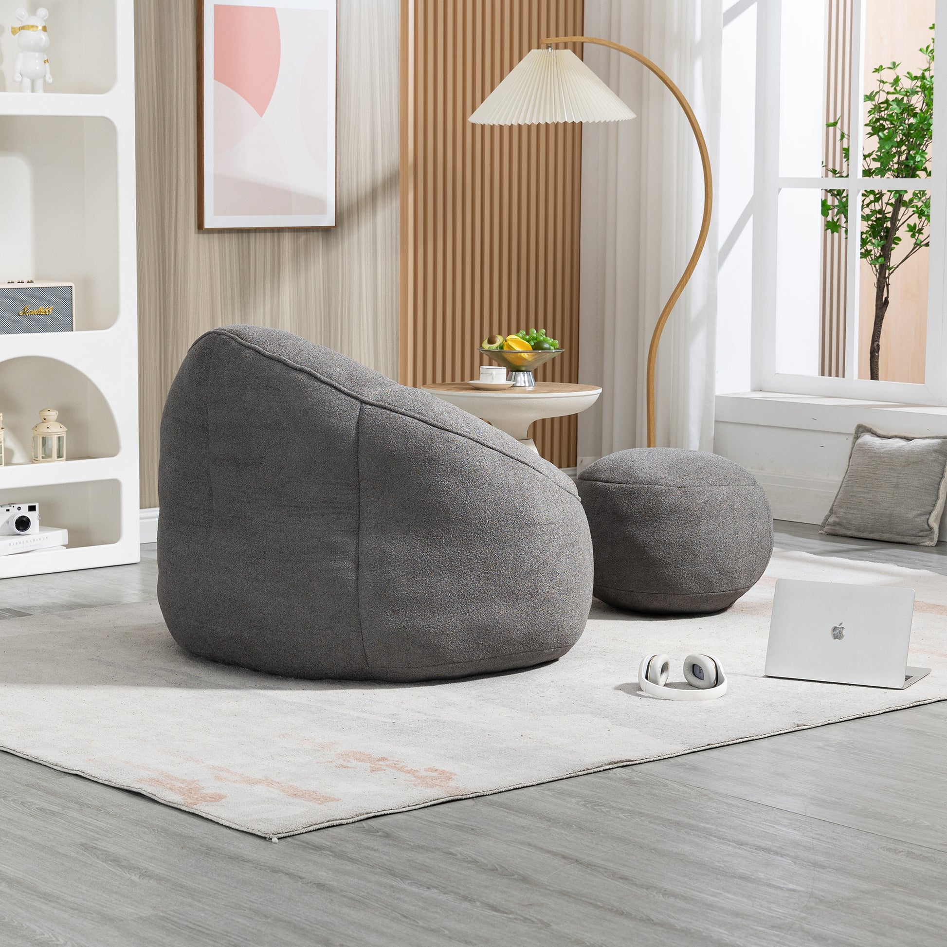 Textured charcoal grey bean bag chair with matching ottoman for ultimate comfort