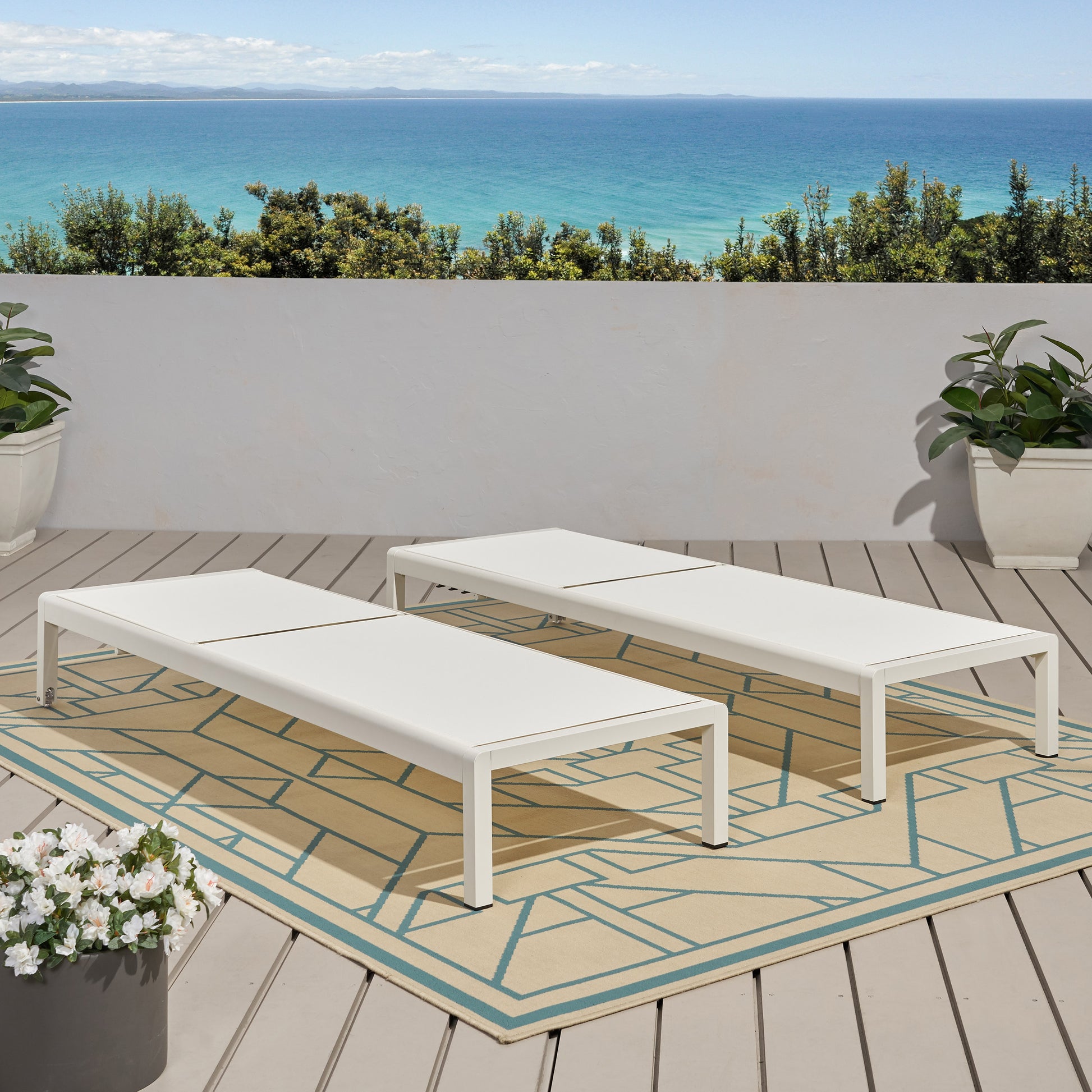 White aluminum outdoor chaise lounge with adjustable back
