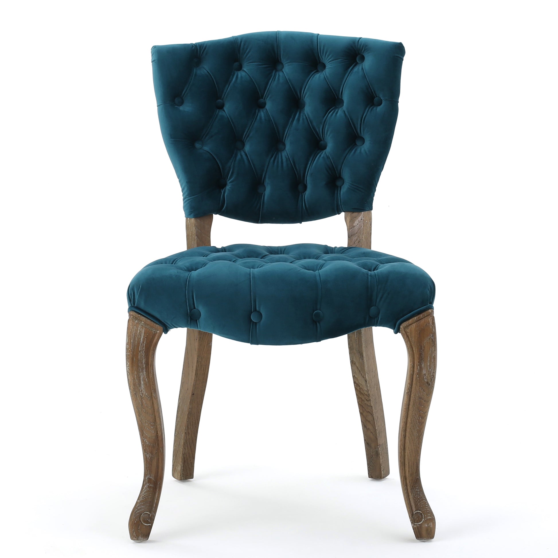 Deep teal velvet accent chair with button tufting and curved wooden legs