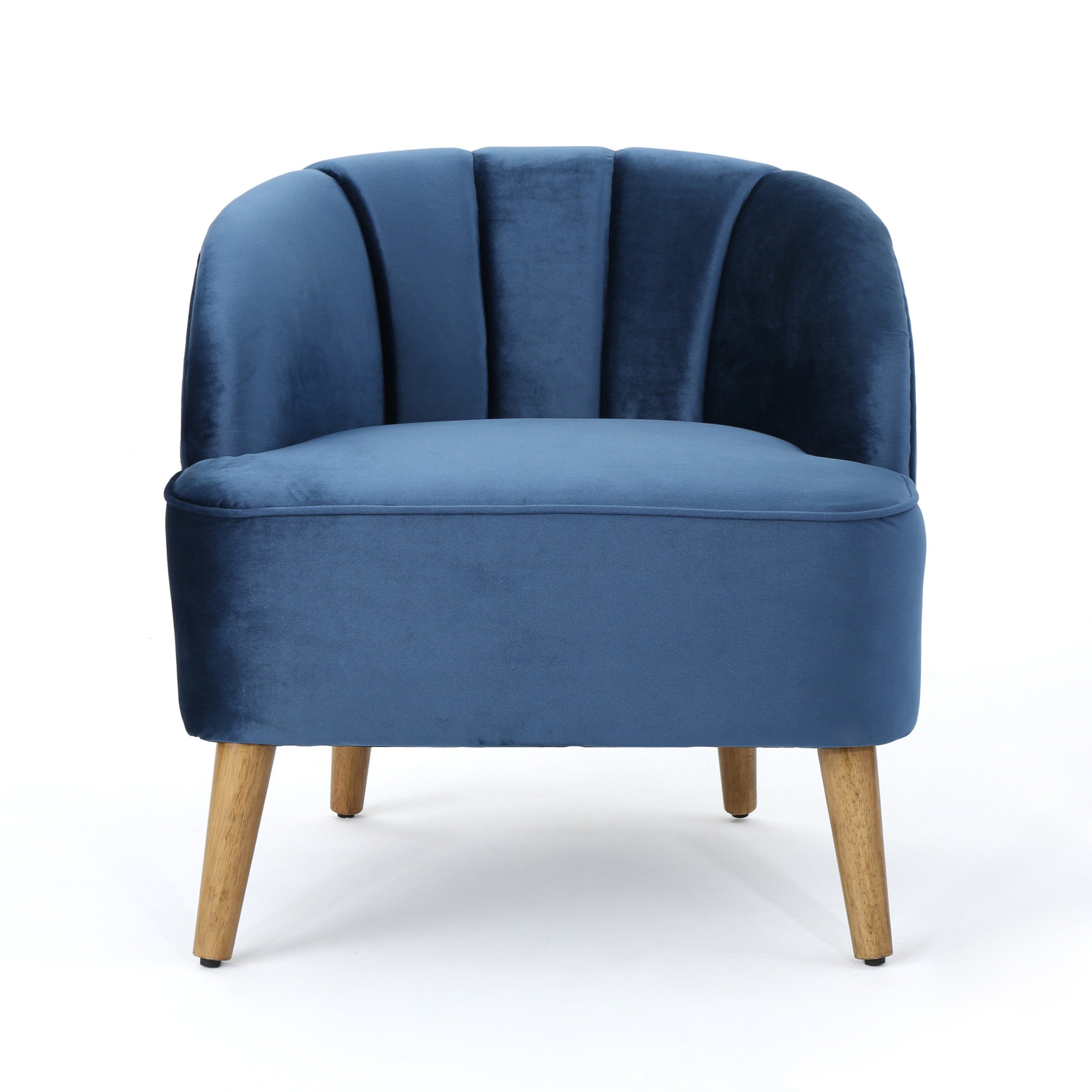 Deep blue velvet armchair with scalloped back and wooden legs perfect for accent seating