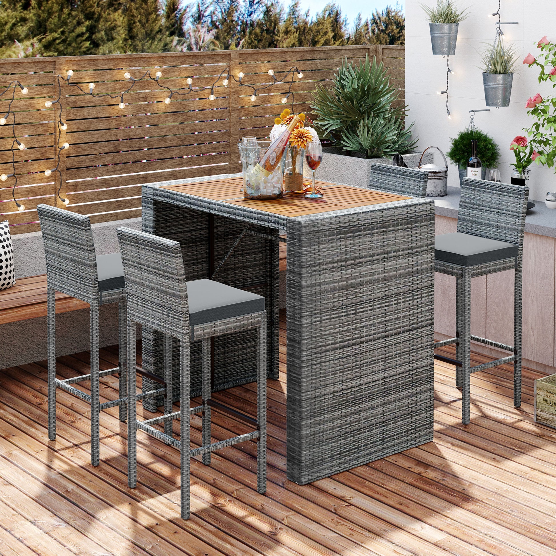 Grey wicker outdoor bar set with wooden tabletop and comfortable seating