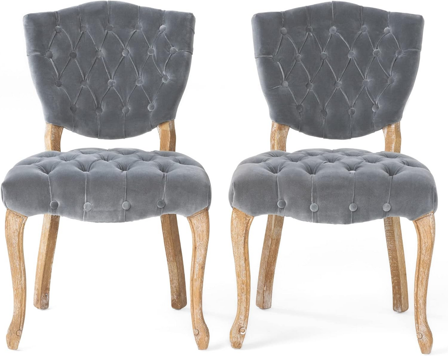 Tufted grey velvet dining chair with ornate wooden legs perfect for elegant interiors