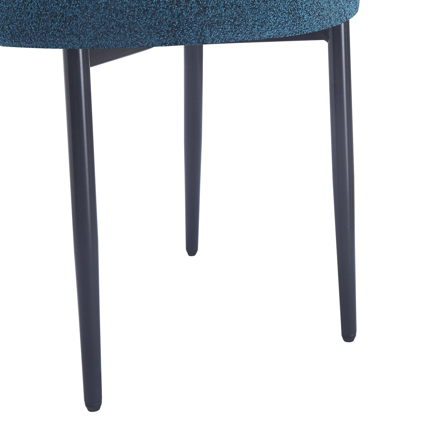 Textured teal fabric seat on a modern chair with dark grey tapered legs
