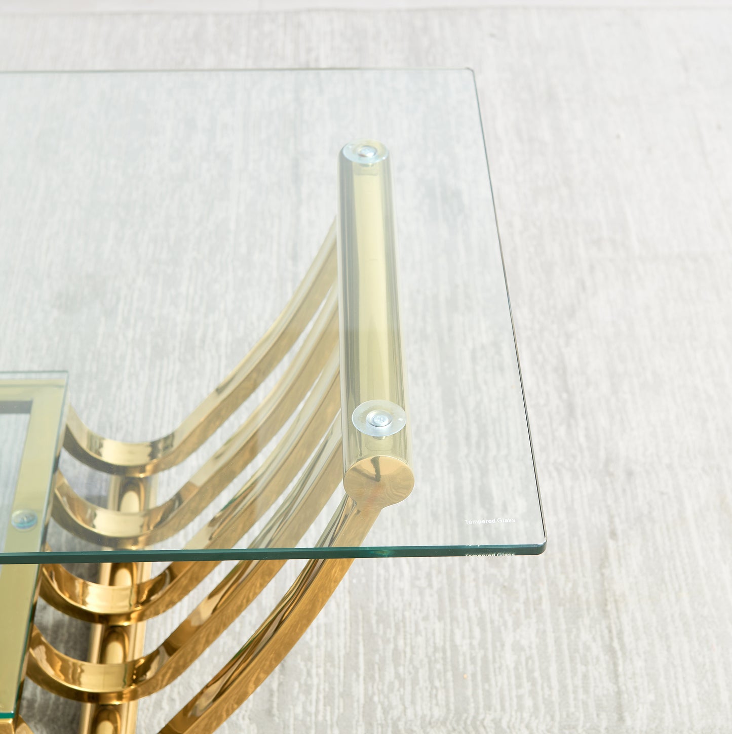 Modern gold frame glass coffee table with curved legs