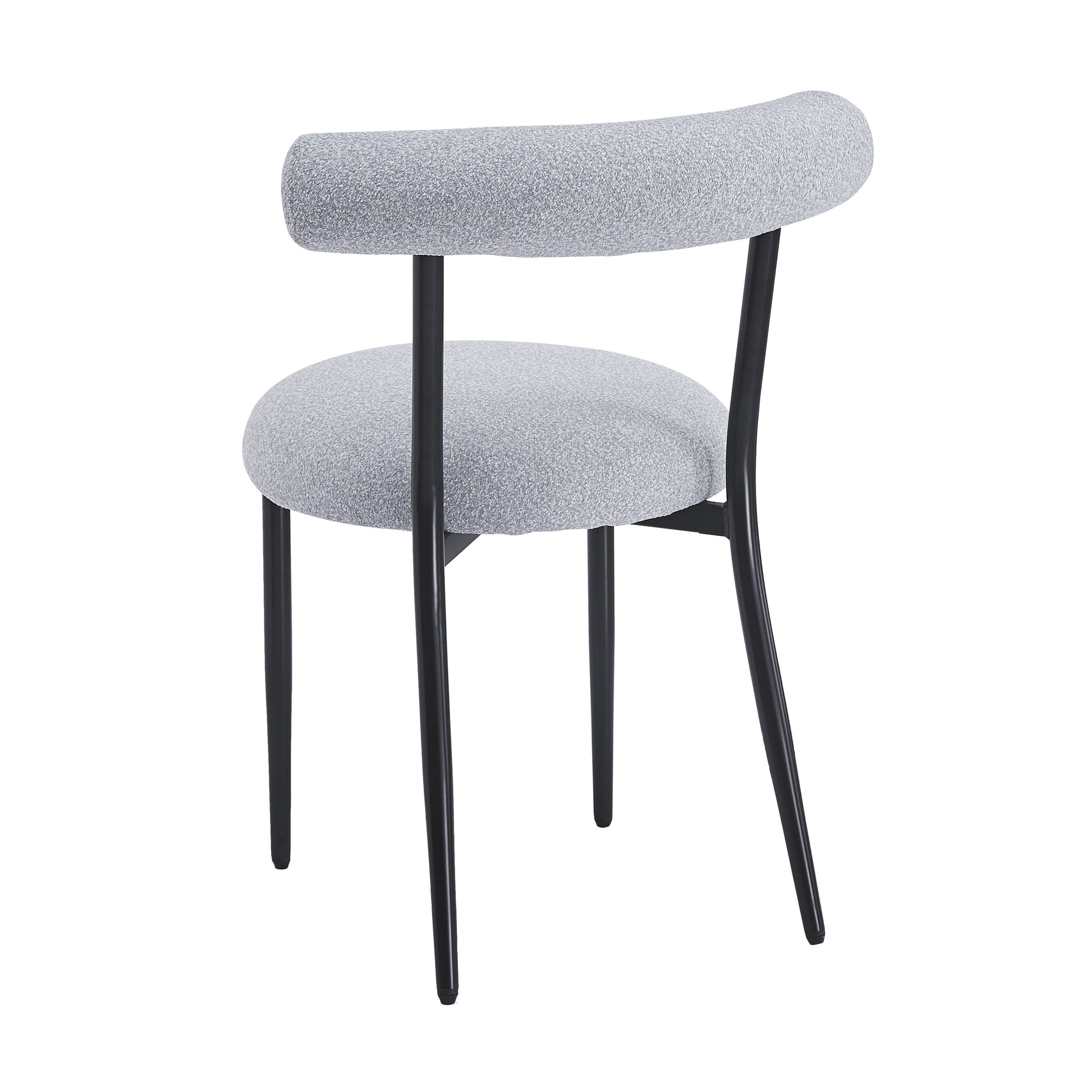 Modern grey textured dining chair with black metal legs for a stylish home accent