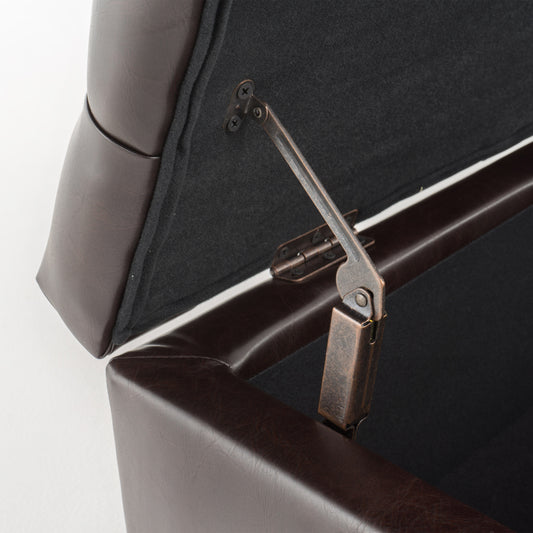 Dark brown faux leather storage ottoman with antique bronze hinge