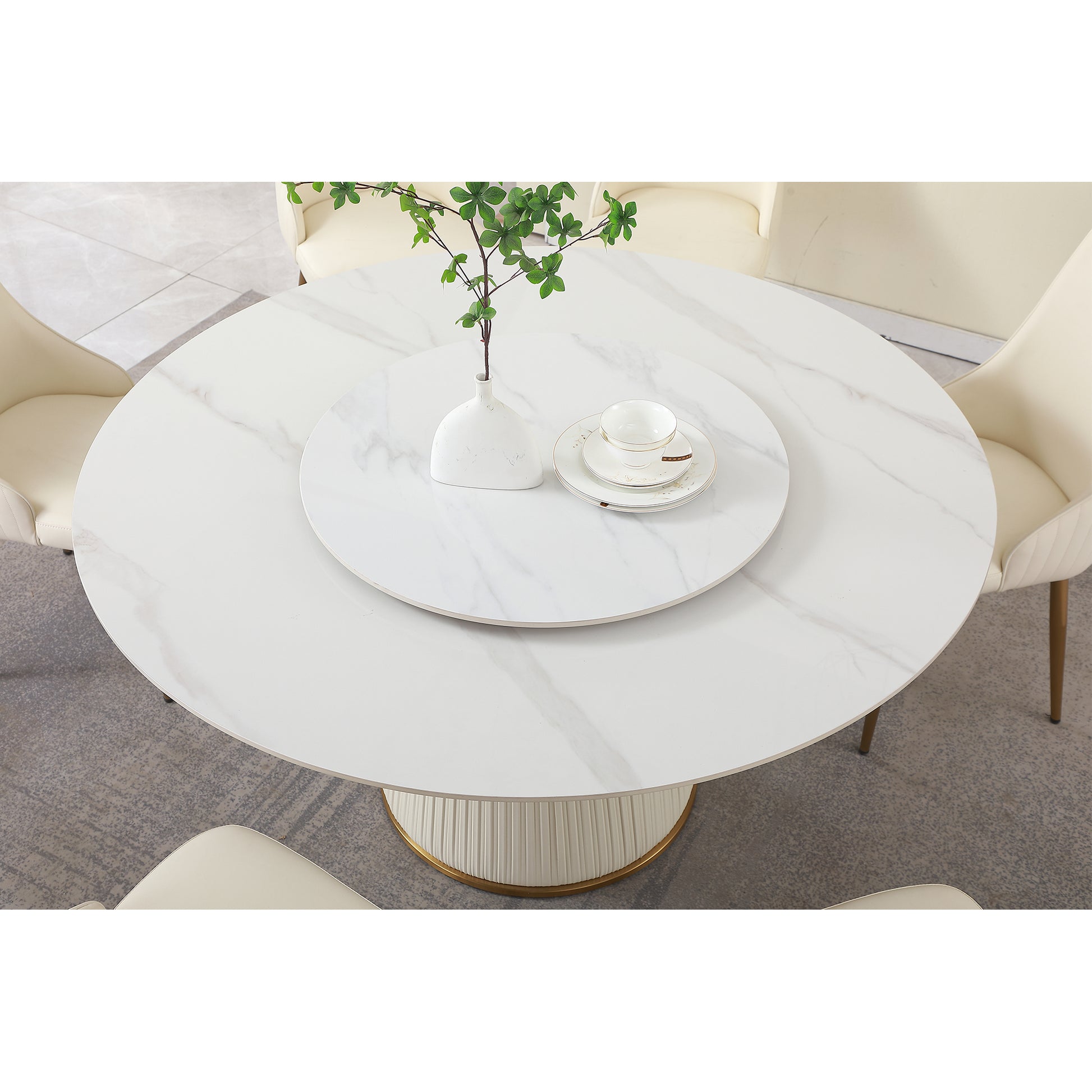 White marble rotating dining table with gold base