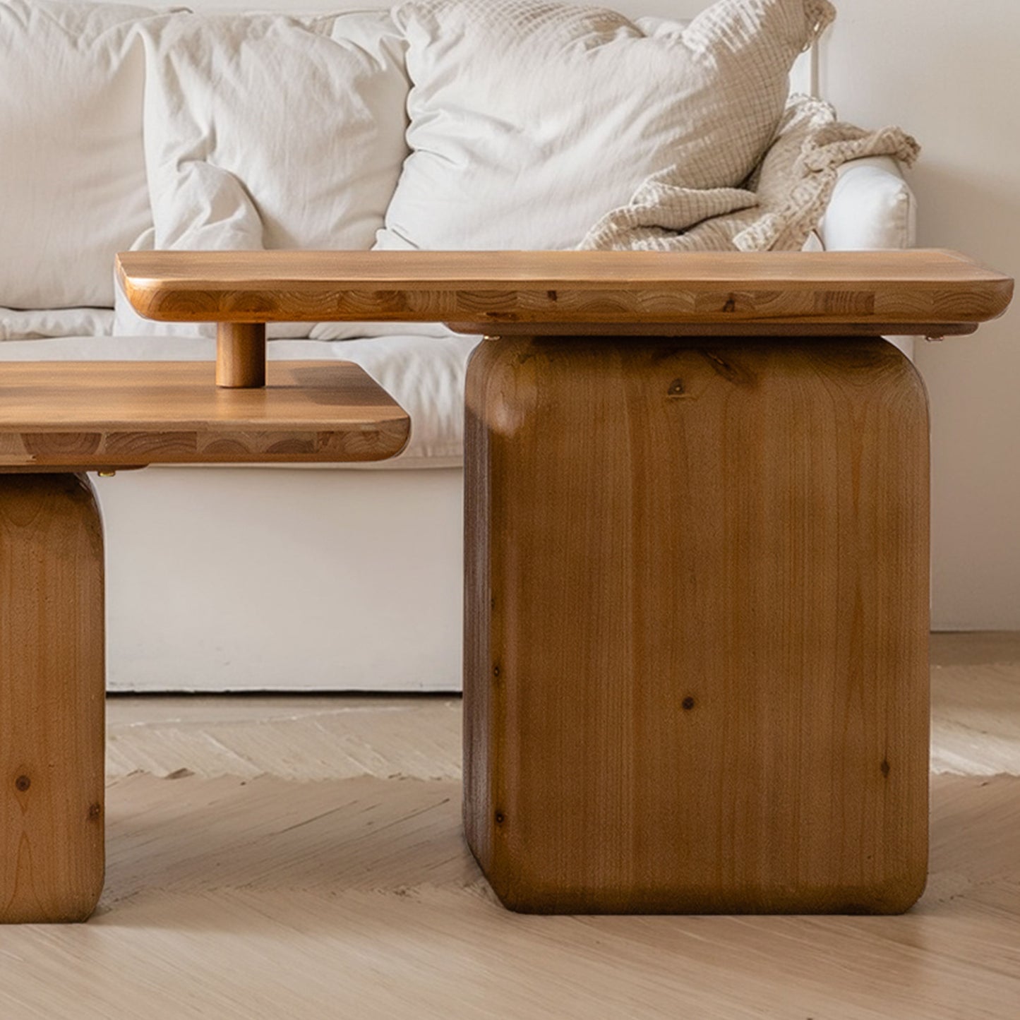 Solid oak wood side table with a thick rounded top and a block pedestal base