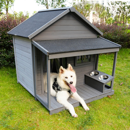 Gray wooden dog house with porch and raised food bowls perfect for outdoor pets