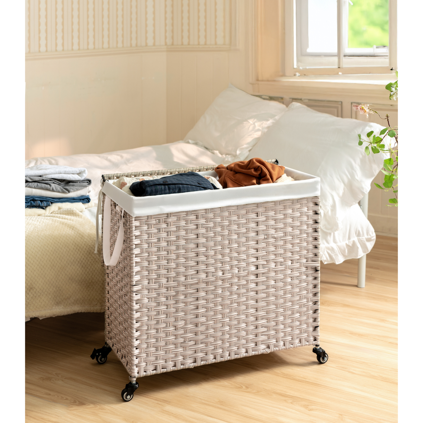 Beige woven laundry basket with wheels filled with clothes