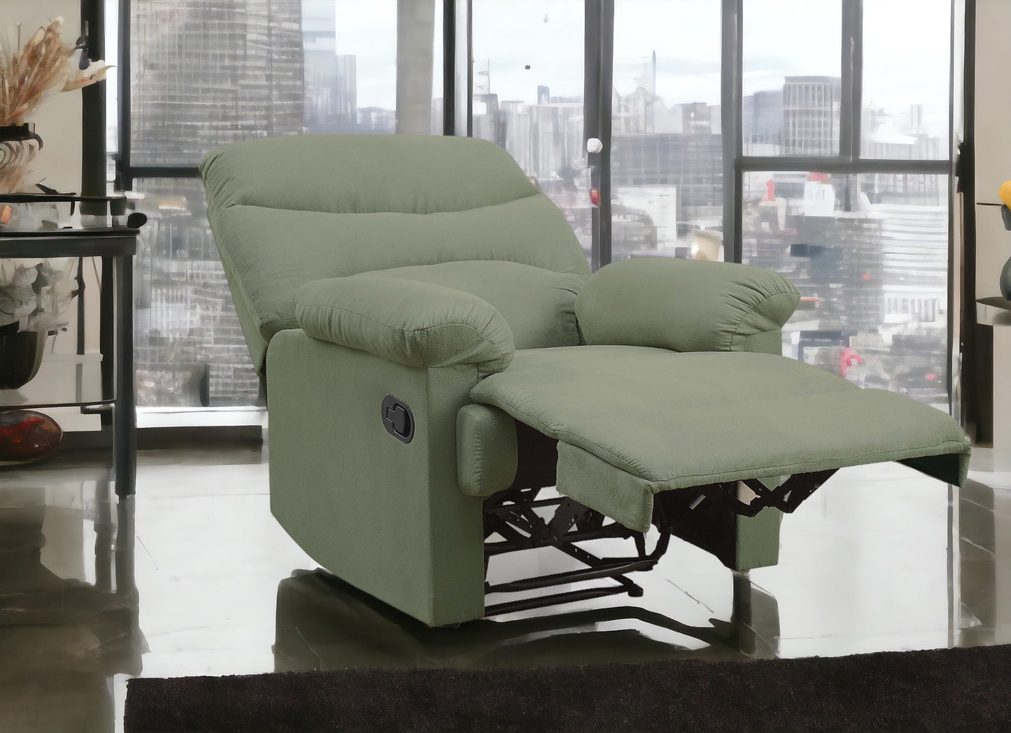 Sage green fabric recliner chair with extended footrest perfect for home relaxation