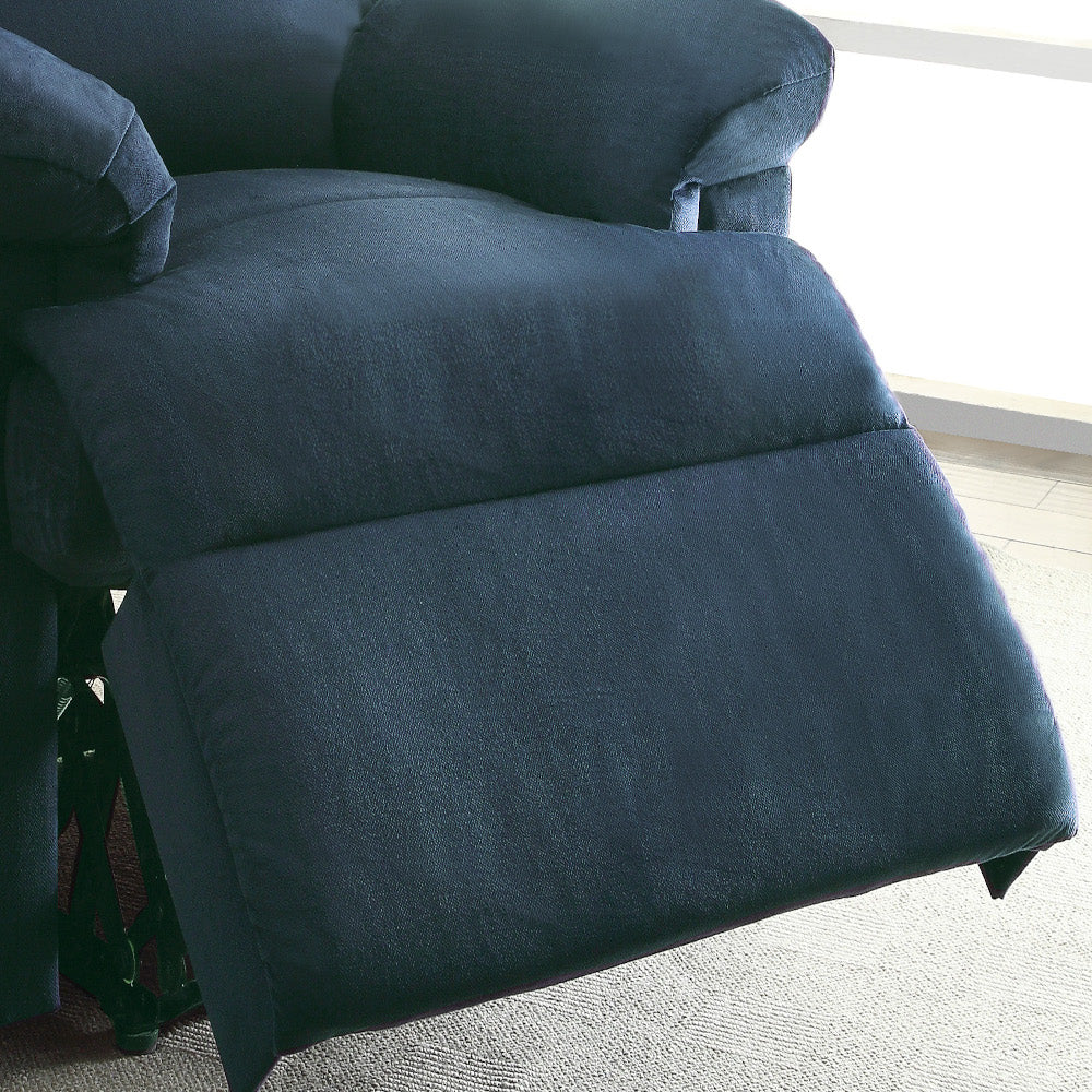 Dark blue velvet recliner with extended footrest plush comfort