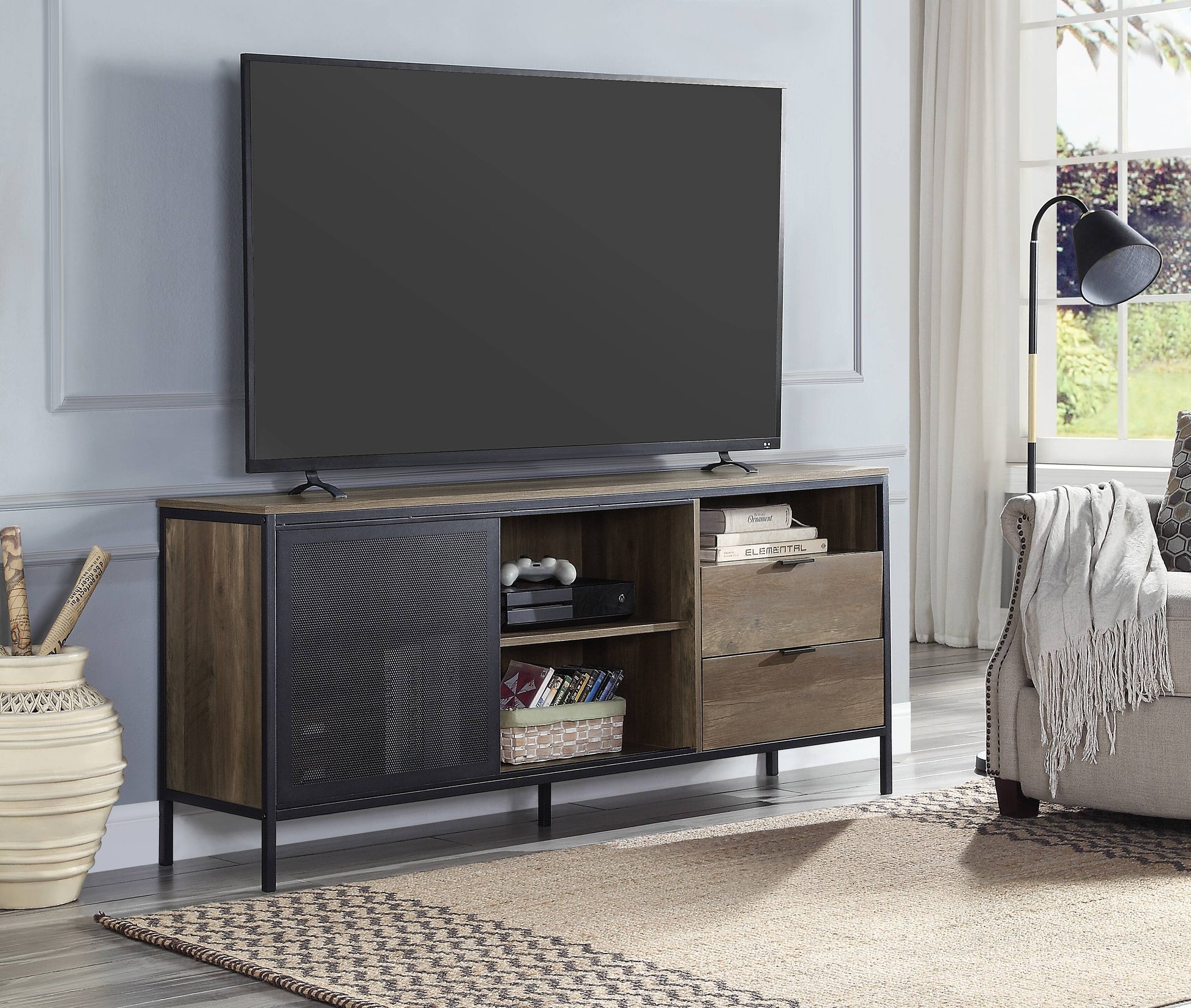 Rustic wood and metal media console with sliding mesh door and two drawers
